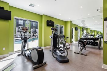 24 Hour State-of-the-Art Fitness Center & Yoga Studio with Pool View